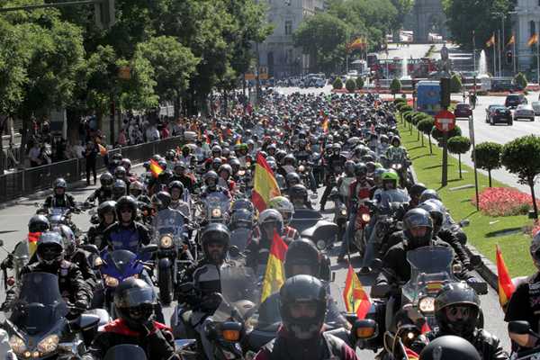 Motorbikes carrying Spanish Flags 