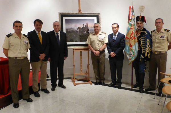 Autoridades asistentes junto al cuadro