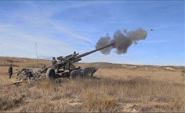 Obús SIAC realizando una Acción de Fuego.