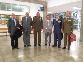 Ponentes y organizador con el Rector