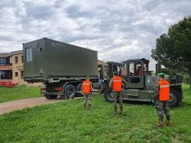 Traslado e instalación de un segundo contenedor ducha en la 